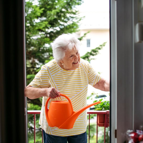 Home-based care by Retire at Home elderly lady in garden